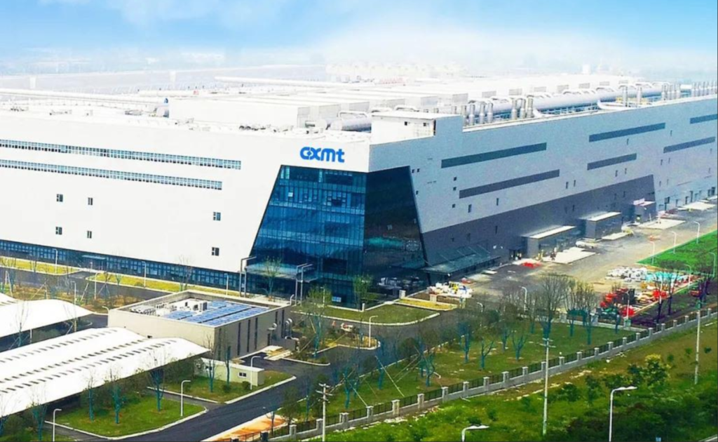 Modern CXMT manufacturing facility with white and gray exterior.